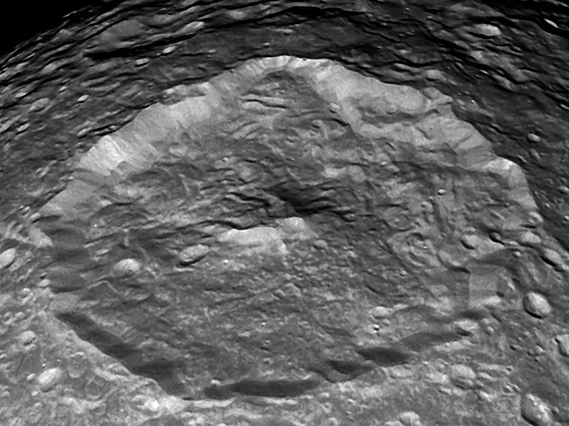 A close view of a huge crater with a central peak