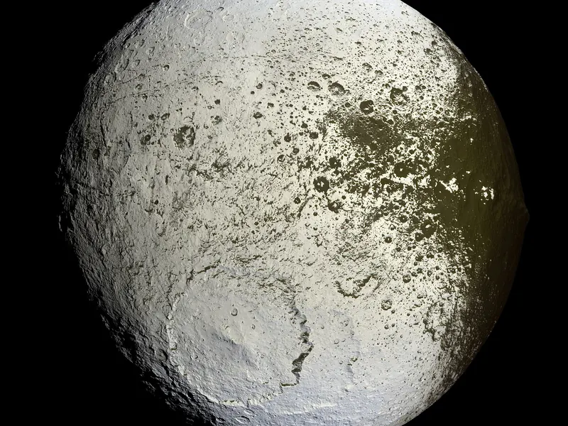 A moon that is very dark on one half and bright on the other